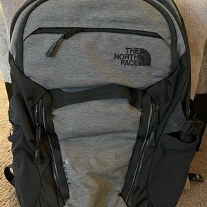 The North Face Surge Backpack; Heathered Gray & Black